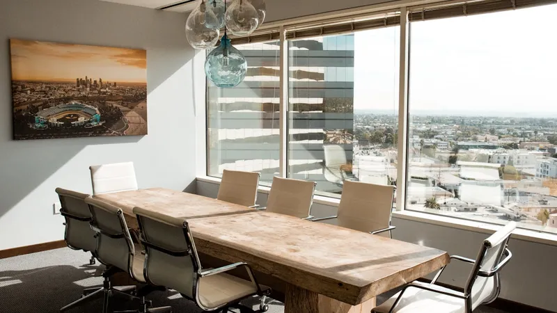 Empty conference room with chairs around table